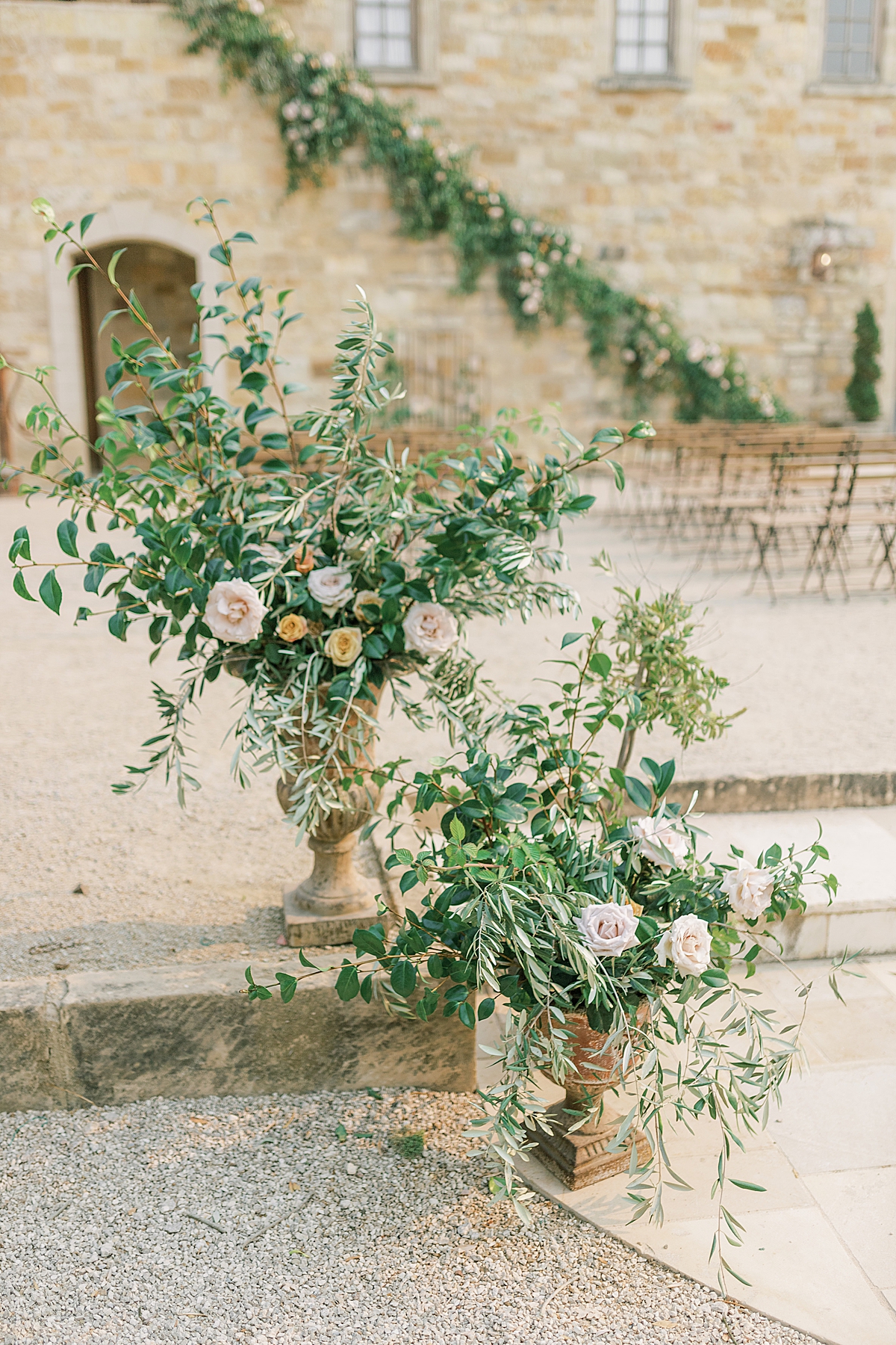 Floral details near the aisle at the ceremony space at this Sunstone Villa Wedding editorial.