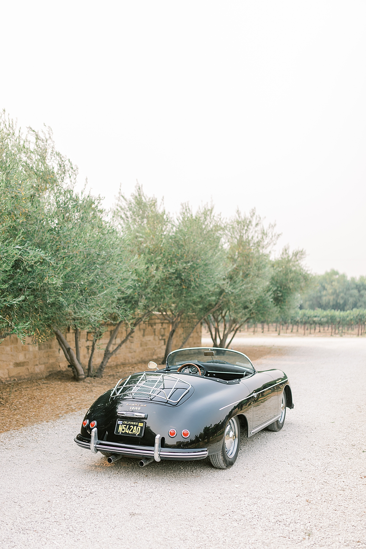 The vintage car at this Sunstone Villa Wedding editorial.