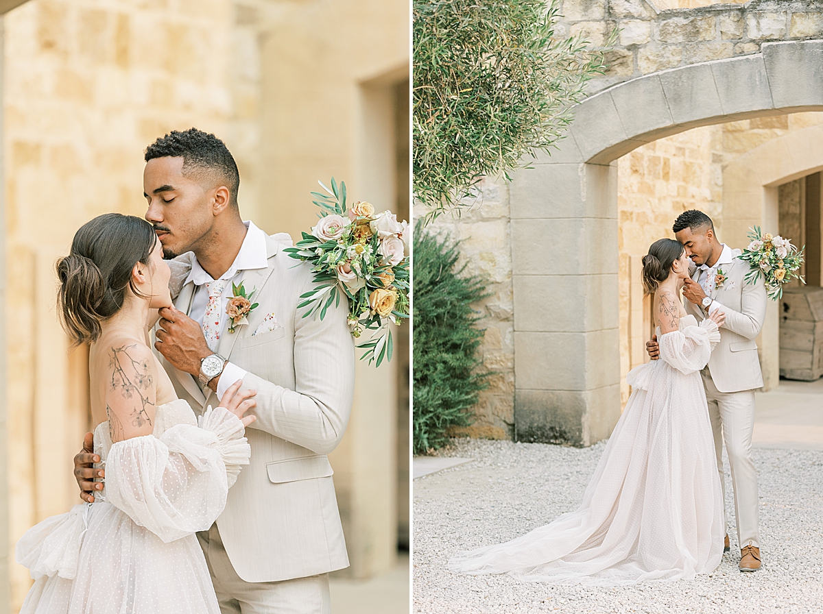 Miya and Luke sharing an intimate moment under a rounded archway at this Sunstone Villa Wedding editorial.