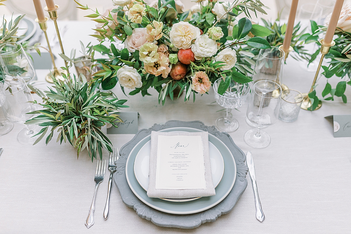 A place setting on the reception table at this Sunstone Villa Wedding editorial.