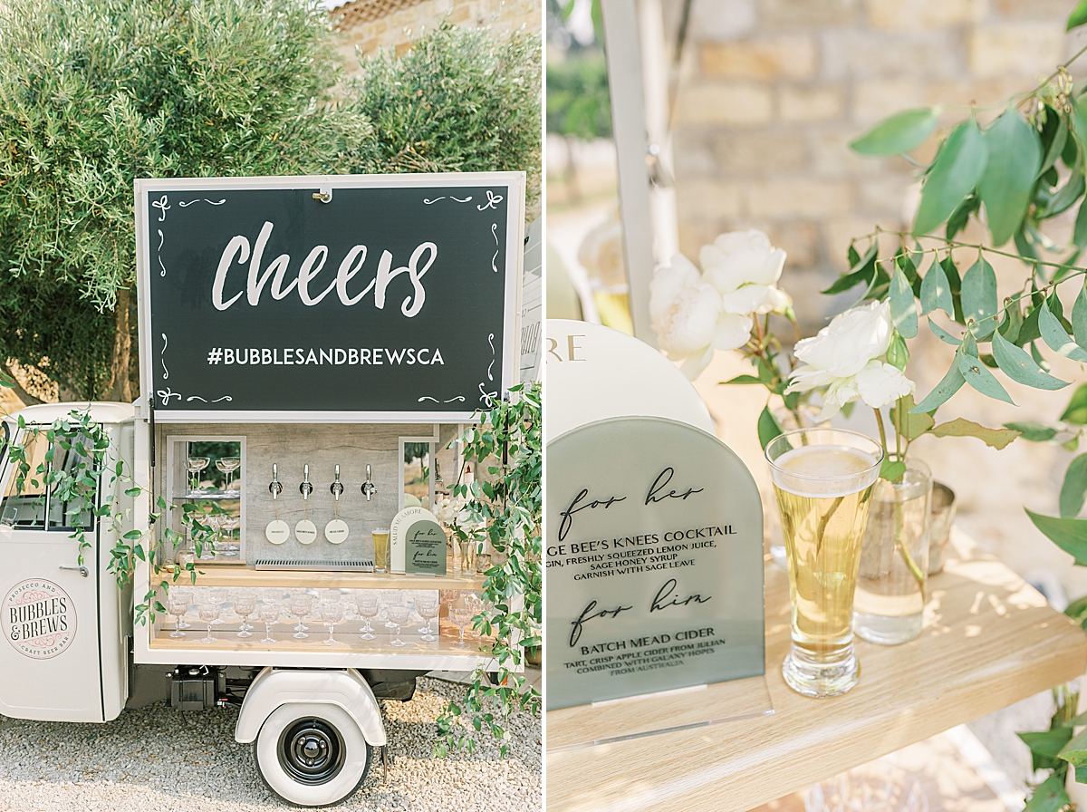 The mobile bar and a couple of drinks with florals around them at this Sunstone Villa Wedding editorial.