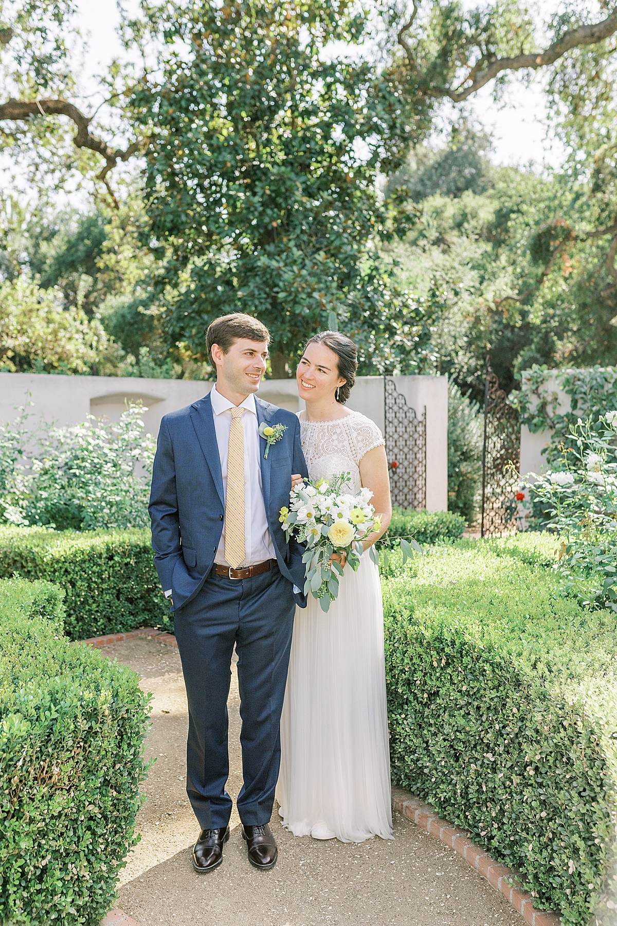 A bride and groom in the courtyard of their private estate wedding in Ojai, California
