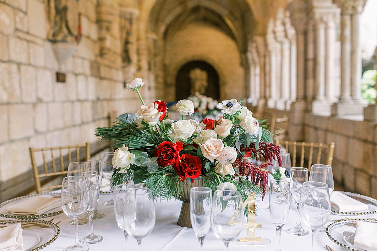 Florals on a table at the reception of this Ancient Spanish Monastery Wedding 