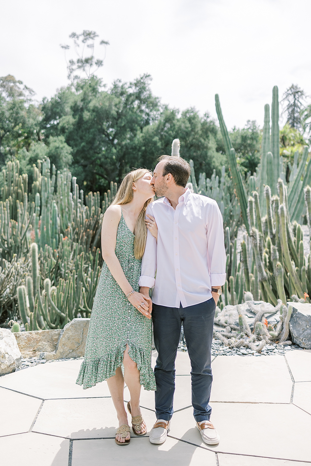 Justine & Alex sharing a kiss at their Montecito proposal at Lotusland